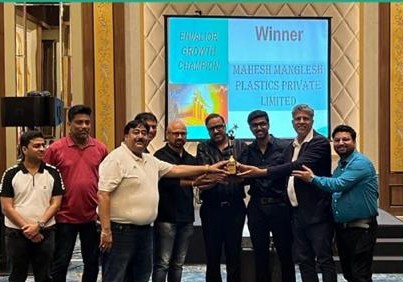 Mahesh Manglesh team receiving the Envalior Growth Champion award at Distributor Meet 2025, Karjat